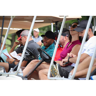 Red and White golf buddies chatting