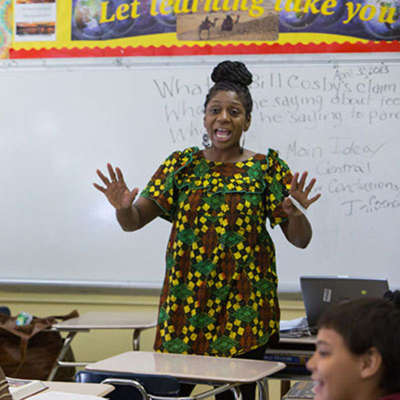 Althea "Faith" Shaw-Hester teaching, image courtesy of The New York Times
