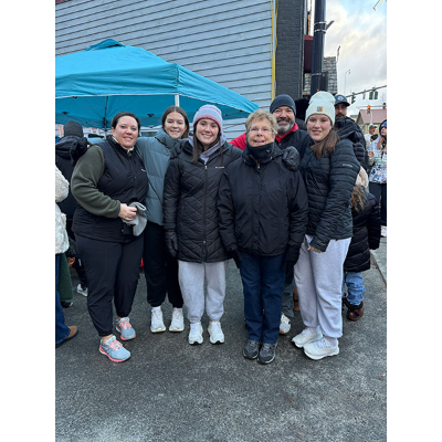 Dann participates in the 2025 Turkey Trot with his family, shown from the left, Marcie (wife), Addy (daughter), Sydney (daughter), Kathy (mom), Dann and Quin, daughter