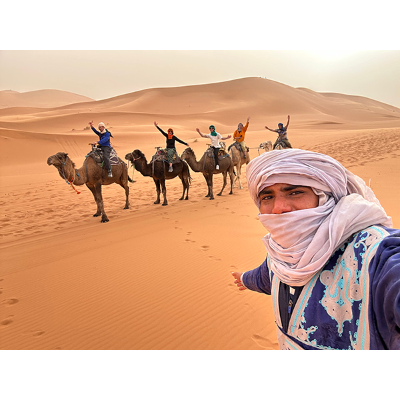 The Faces of Study Abroad, first place: Shaun Phillips, “Camel Through Sahara Desert” — Africa