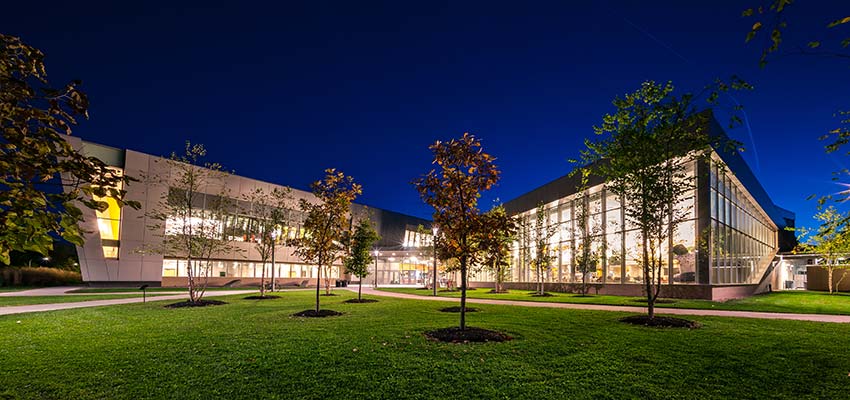 Student Life Center at night with lights on