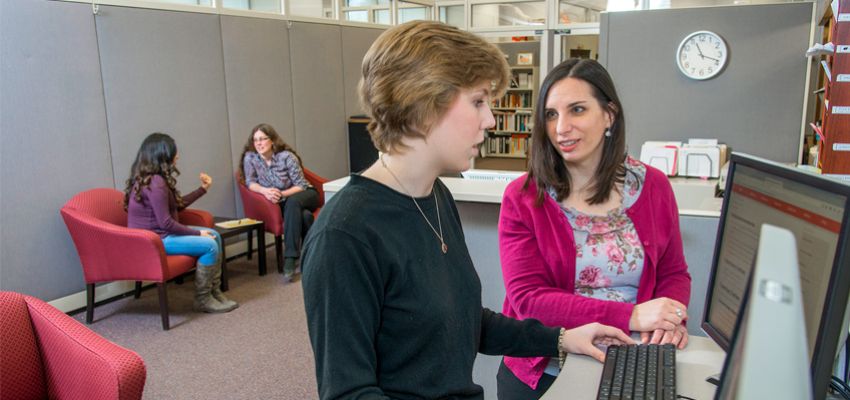A Student and Professional Staff at their SUNY Cortland jobs