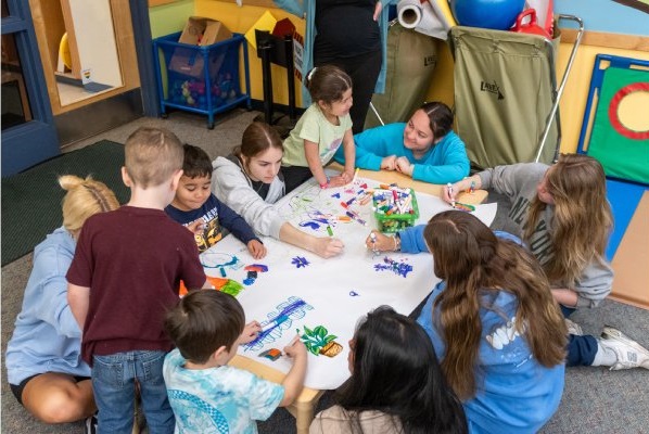 Student teachers with classroom