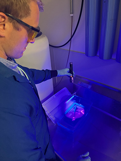 Duerr working on lab equipment