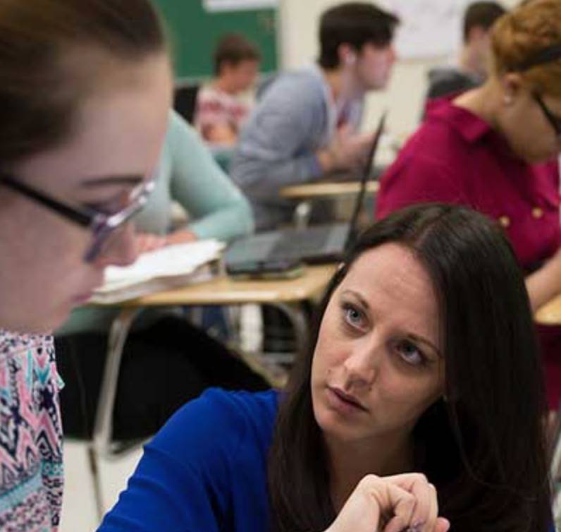 English Teacher in a high school classroom