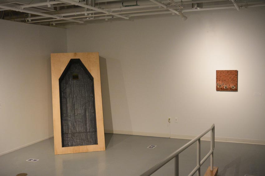 View into the east gallery at Dowd Gallery featuring sculptural objects produced by Buffalo-based sculptor Gary Sczerbaniewicz.   