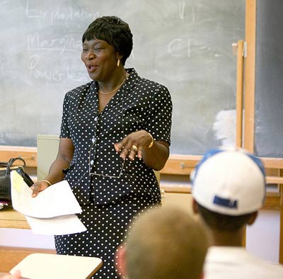 Professor in the Geography department teaching in a classroom