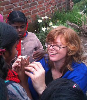 Jena Curtis in India Jena Curtis plays hand games in Indian village