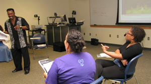 Seth, left, facilitates a discussion