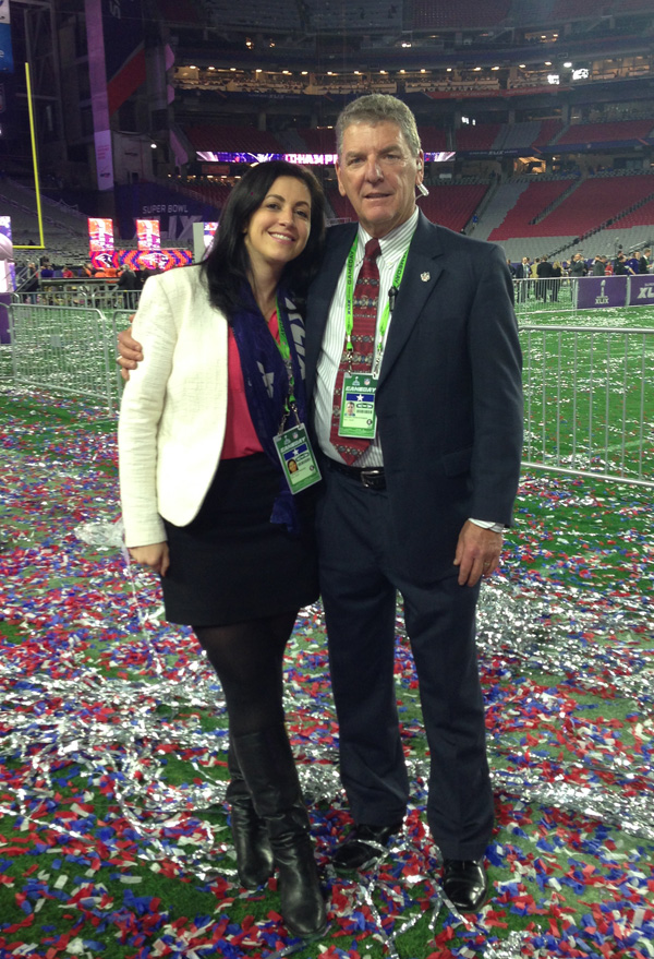 Katie Keenan with the head of NFL security at the Super Bowl